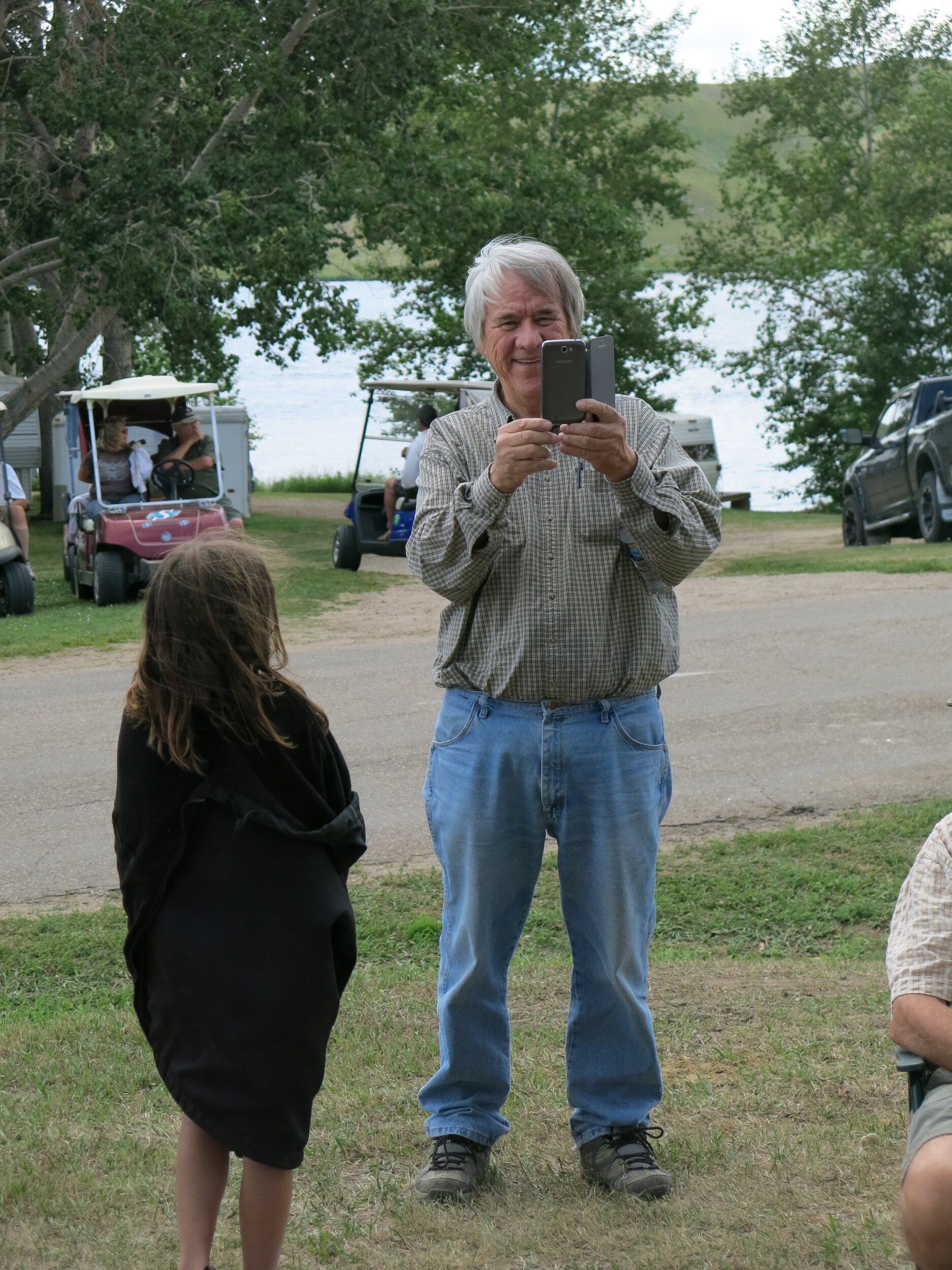 Photo, Lennard Morin Takes Photos at Unveiling of the Lac Pelletier Monument to The Métis War Veterans Erected by Ponteix Prairie Dog Métis Local 123